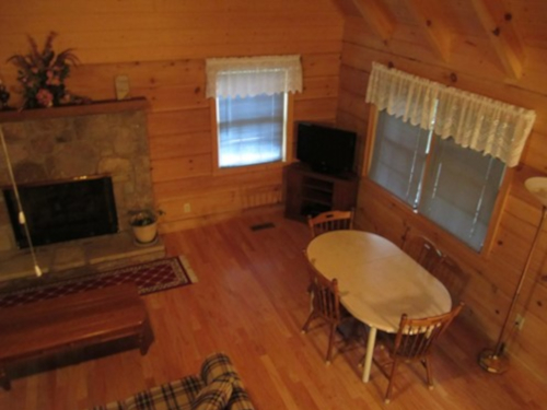 Cable TV, Hot tub, trash pick up, Two queen-size beds includes linens, bathroom shower/tub & two sinks, hairdryer, towels & wash clothes, kitchen includes range, refrigerator, microwave, toaster, coffeemaker | Highland Glade Cabin Rentals | Gatlinburg, TN